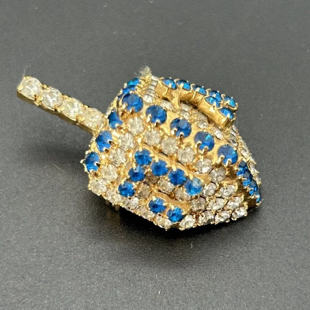 Vintage Bauer Brooch Pin Dreidel Gold Tone Clear Blue Rhinestones Bling 3D